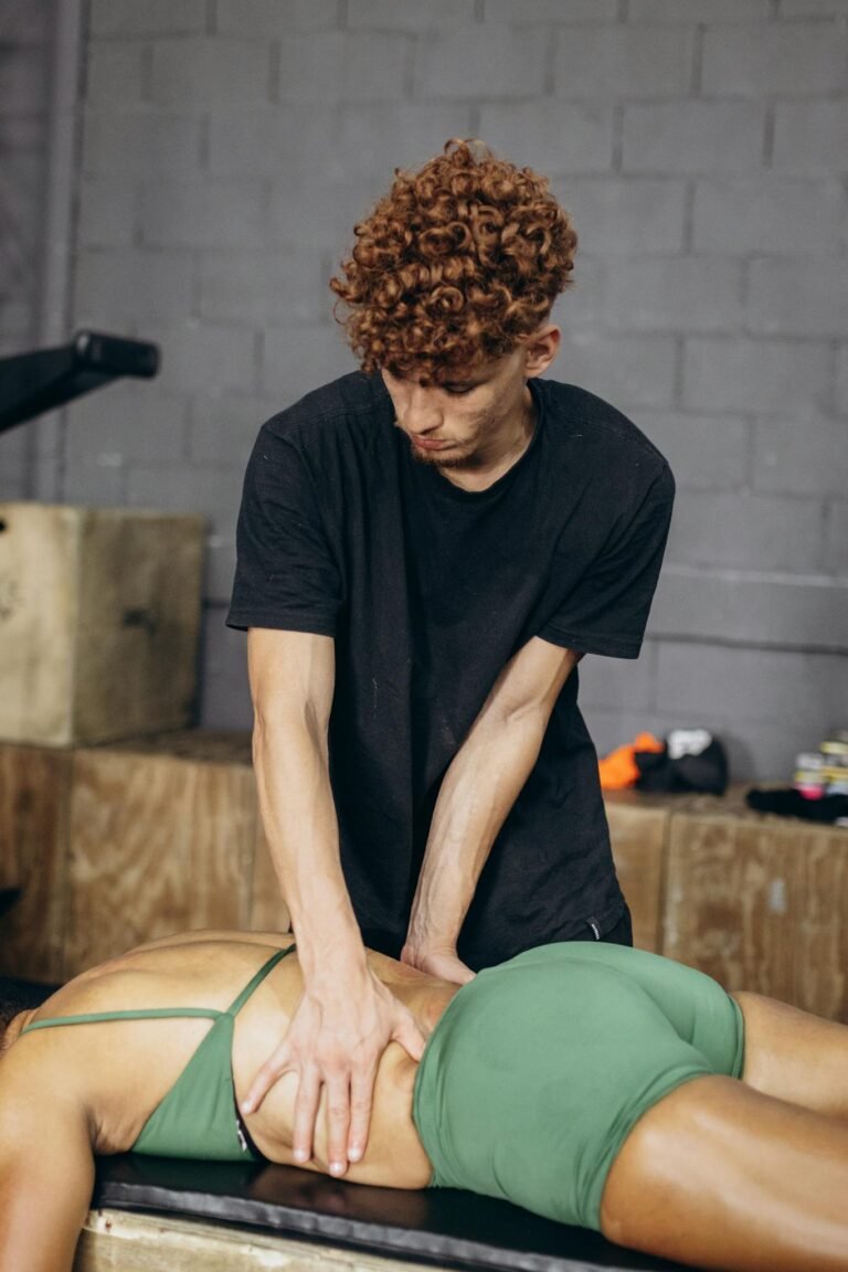 Therapist performs massage therapy for myofascial release and rehabilitation